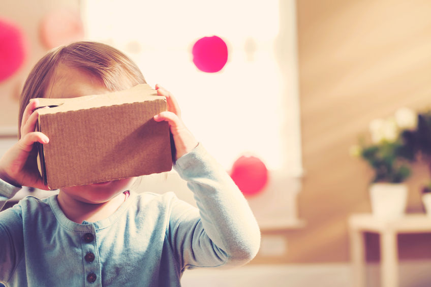 53677953 - toddler girl using a new virtual reality headset