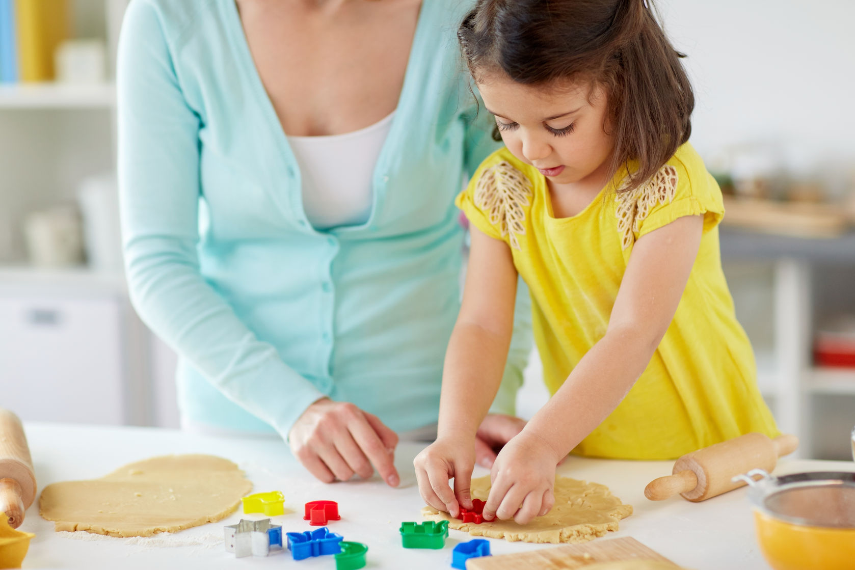 Numeracy Skills - Cooking with a child can help improve measuring and counting skills