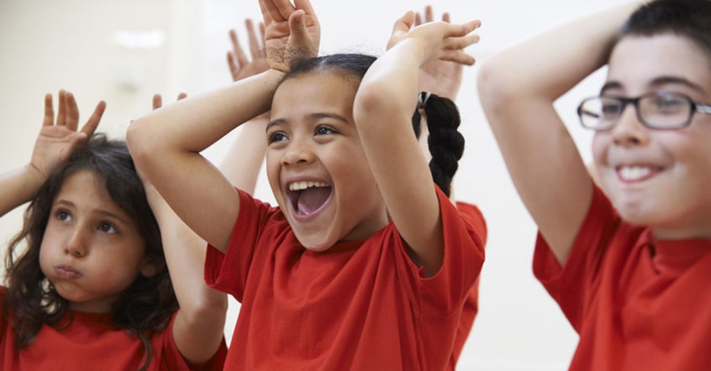 43392459 – group of children enjoying drama class together