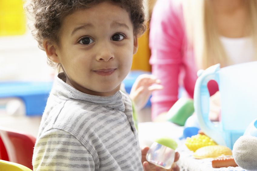 boy playing with toys in autism friendly nursery