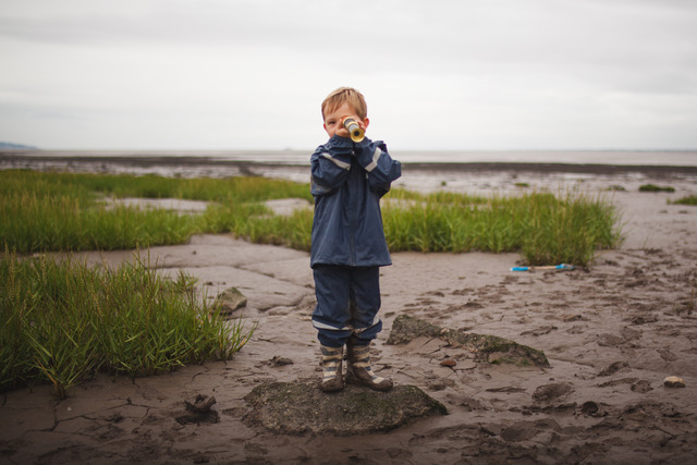 boy on beach schools