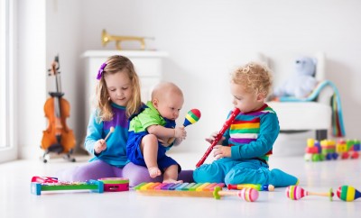 Best musical toys - children playing with instruments
