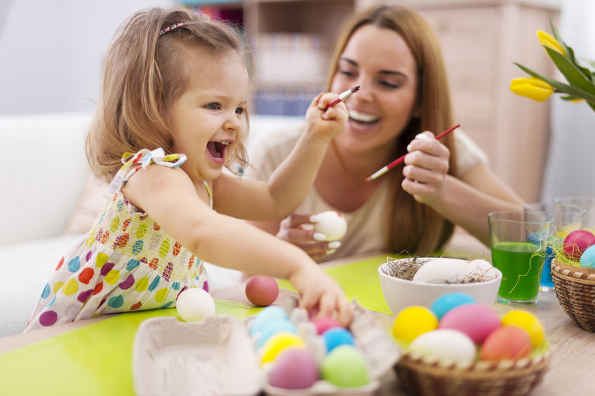 Happy time while painting easter eggs