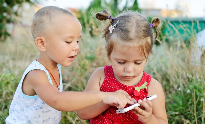 children using smart phone